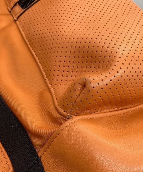 COACH（コーチ）COACH (コーチ) レザーリュック オレンジ×ブラックの古着・服飾アイテム