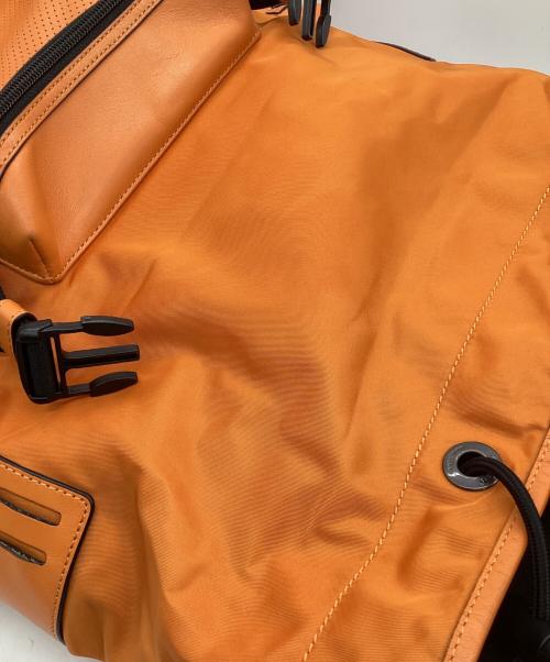 COACH（コーチ）COACH (コーチ) レザーリュック オレンジ×ブラックの古着・服飾アイテム