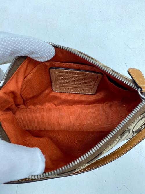 COACH（コーチ）COACH (コーチ) アクセサリーポーチ ベージュの古着・服飾アイテム