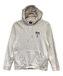 stussy（ステューシー）の古着「WORLD TOUR HOODIE（ワールド ツアー フーディー）」｜ホワイト
