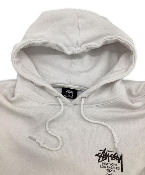 stussy（ステューシー）stussy (ステューシー) WORLD TOUR HOODIE（ワールド ツアー フーディー） ホワイト サイズ:Mの古着・服飾アイテム