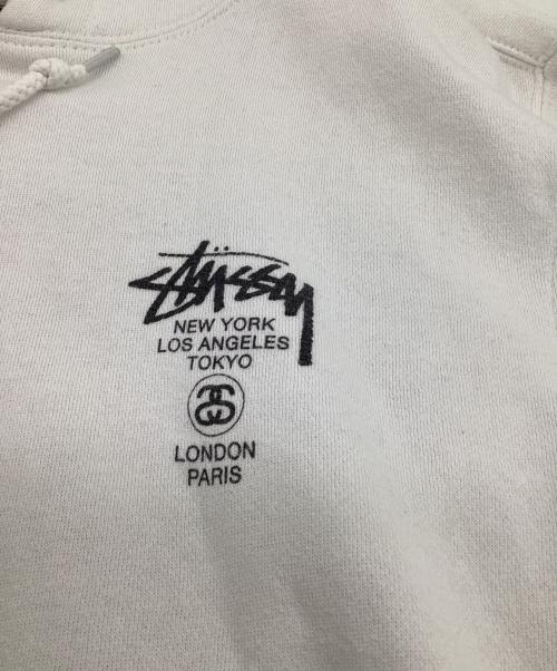 stussy（ステューシー）stussy (ステューシー) WORLD TOUR HOODIE（ワールド ツアー フーディー） ホワイト サイズ:Mの古着・服飾アイテム