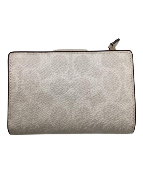 COACH（コーチ）COACH (コーチ) ミディアム コーナー ジップ ウォレット シグネチャー キャンバス ベージュの古着・服飾アイテム