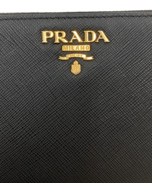 PRADA（プラダ）PRADA (プラダ) サフィアーノラウンドジップファスナー財布 1ML506 ブラック×ピンクの古着・服飾アイテム