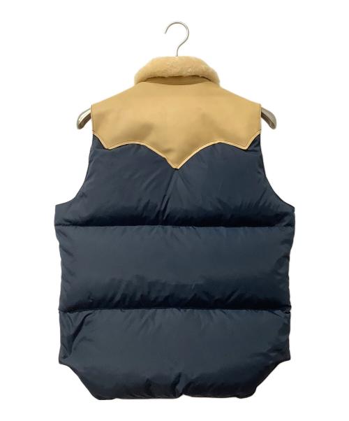 Rocky Mountain FeatherBed（ロッキーマウンテンフェザーベッド）Rocky Mountain FeatherBed (ロッキーマウンテンフェザーベッド) ベスト Down Vest ネイビー×イエロー サイズ:38の古着・服飾アイテム