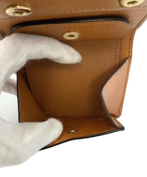 WILDSWANS（ワイルドスワンズ）WILDSWANS (ワイルドスワンズ) 2つ折り財布 CASA ブラウンの古着・服飾アイテム