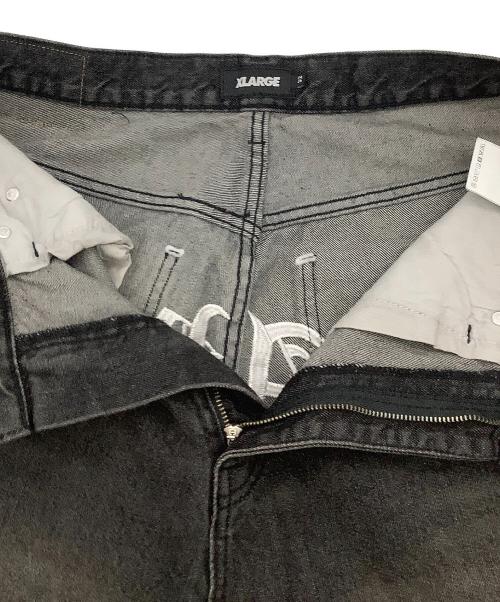 X-LARGE（エクストララージ）X-LARGE (エクストララージ) ジーンズ OLD ENGLISH BAGGY DENIM PANTS ブラック サイズ:32inchの古着・服飾アイテム
