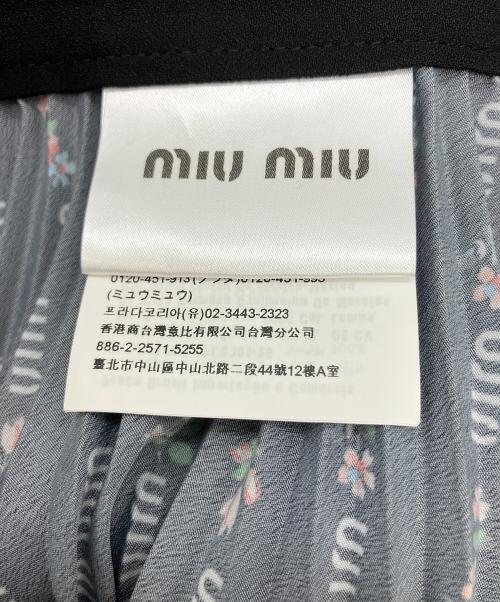 MIU MIU（ミュウミュウ）MIU MIU (ミュウミュウ) プリーツスカート　花柄 ブラック サイズ:Sの古着・服飾アイテム