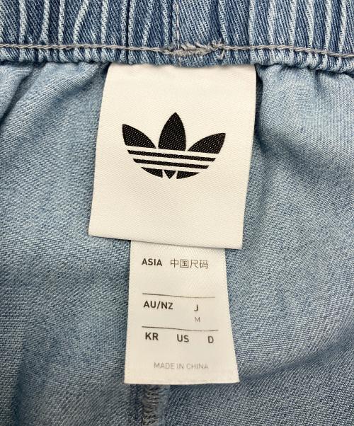 adidas（アディダス）adidas (アディダス) デニムパンツ　ファイヤーバード トラックパンツ スカイブルー サイズ:Mの古着・服飾アイテム