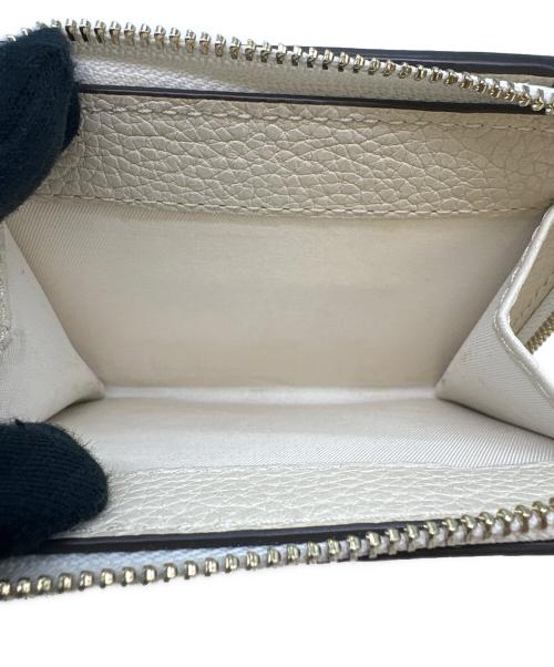 TORY BURCH（トリーバーチ）TORY BURCH (トリーバーチ) TORY BURCH　2つ折り財布 アイボリーの古着・服飾アイテム