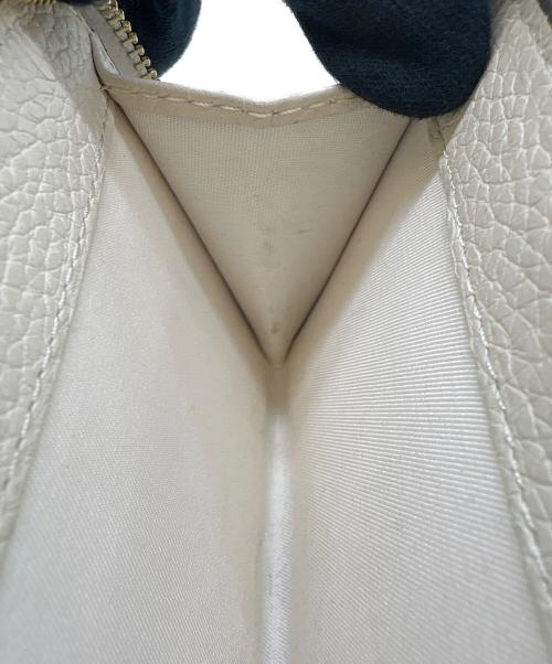 TORY BURCH（トリーバーチ）TORY BURCH (トリーバーチ) TORY BURCH　2つ折り財布 アイボリーの古着・服飾アイテム