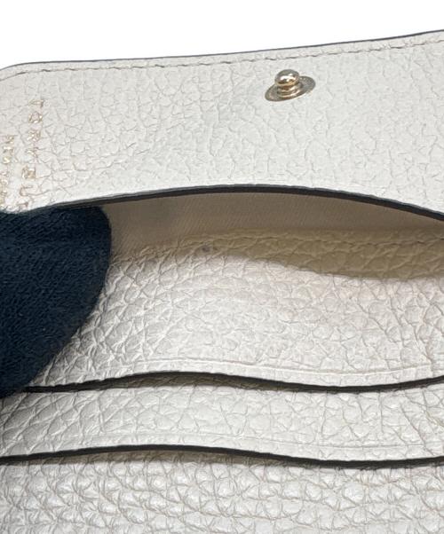 TORY BURCH（トリーバーチ）TORY BURCH (トリーバーチ) TORY BURCH　2つ折り財布 アイボリーの古着・服飾アイテム