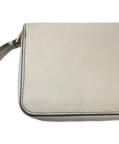 TORY BURCH（トリーバーチ）TORY BURCH (トリーバーチ) TORY BURCH　2つ折り財布 アイボリーの古着・服飾アイテム