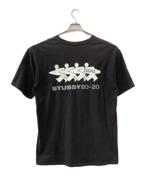 stussy（ステューシー）stussy (ステューシー) CDG (シーディージー) サーフマンTシャツ ブラック サイズ:XLの古着・服飾アイテム