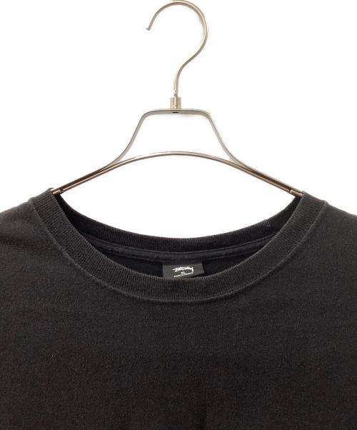 stussy（ステューシー）stussy (ステューシー) CDG (シーディージー) サーフマンTシャツ ブラック サイズ:XLの古着・服飾アイテム