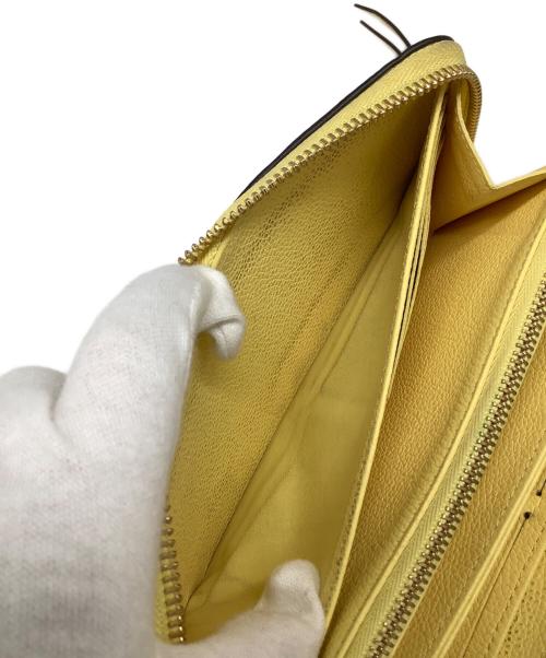 LOUIS VUITTON（ルイ ヴィトン）LOUIS VUITTON (ルイ ヴィトン) モノグラム・アンプラントジッピーウォレット イエローの古着・服飾アイテム