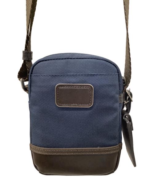 TUMI（トゥミ）TUMI (トゥミ) ショルダーポーチ ネイビー×ブラウンの古着・服飾アイテム