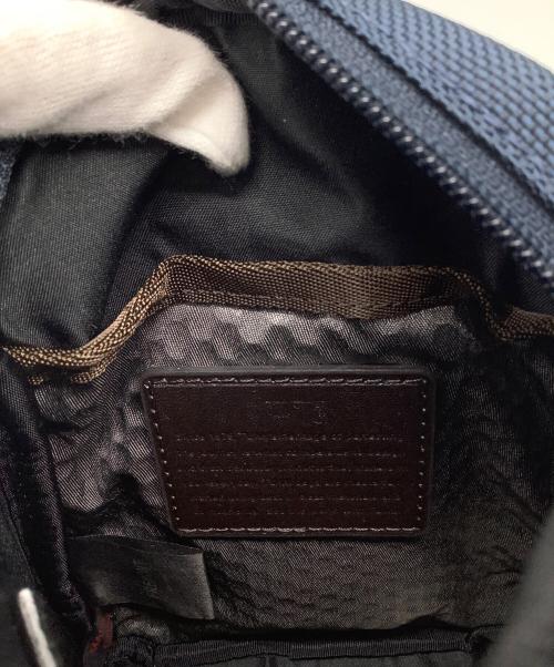TUMI（トゥミ）TUMI (トゥミ) ショルダーポーチ ネイビー×ブラウンの古着・服飾アイテム