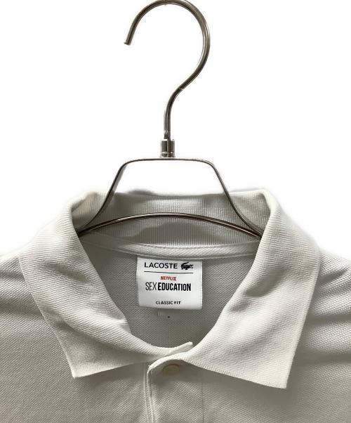 LACOSTE（ラコステ）LACOSTE (ラコステ) NETFLIX (ネットフリックス) ポロシャツ ホワイト サイズ:3の古着・服飾アイテム