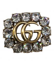 GUCCI（グッチ）の古着「GGマーモントクリスタルブローチ」｜ゴールド