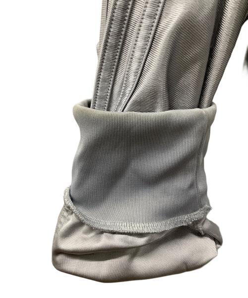 adidas（アディダス）adidas (アディダス) オーバーサイズ ファイヤーバード トラックトップ シルバーカラー サイズ:Mの古着・服飾アイテム