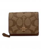 COACHコーチ）の古着「シグネチャー コンパクトウォレット」｜ベージュ