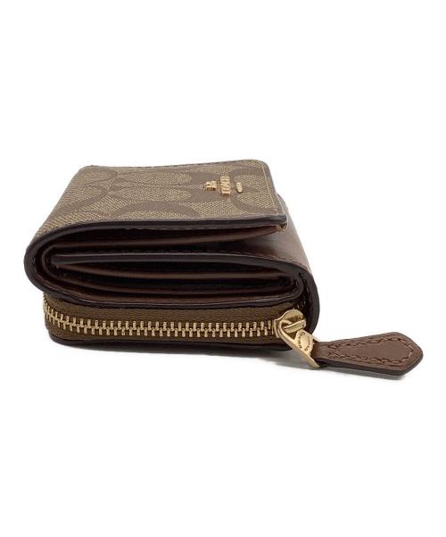 COACH（コーチ）COACH (コーチ) シグネチャー コンパクトウォレット ベージュの古着・服飾アイテム