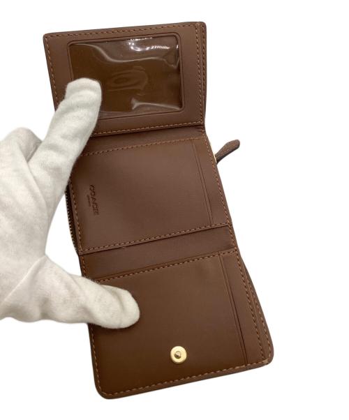 COACH（コーチ）COACH (コーチ) シグネチャー コンパクトウォレット ベージュの古着・服飾アイテム