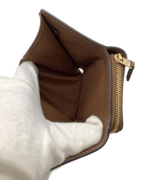 COACH（コーチ）COACH (コーチ) シグネチャー コンパクトウォレット ベージュの古着・服飾アイテム