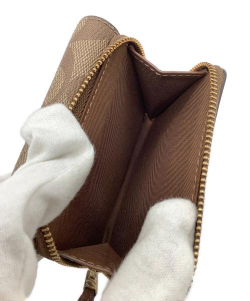 COACH（コーチ）COACH (コーチ) シグネチャー コンパクトウォレット ベージュの古着・服飾アイテム