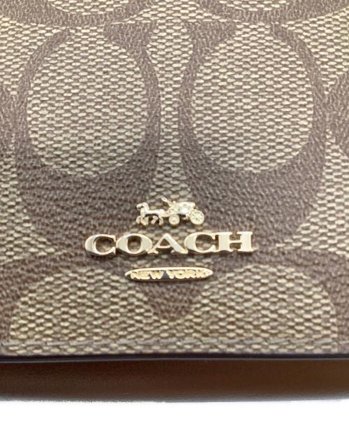 COACH（コーチ）COACH (コーチ) シグネチャー コンパクトウォレット ベージュの古着・服飾アイテム