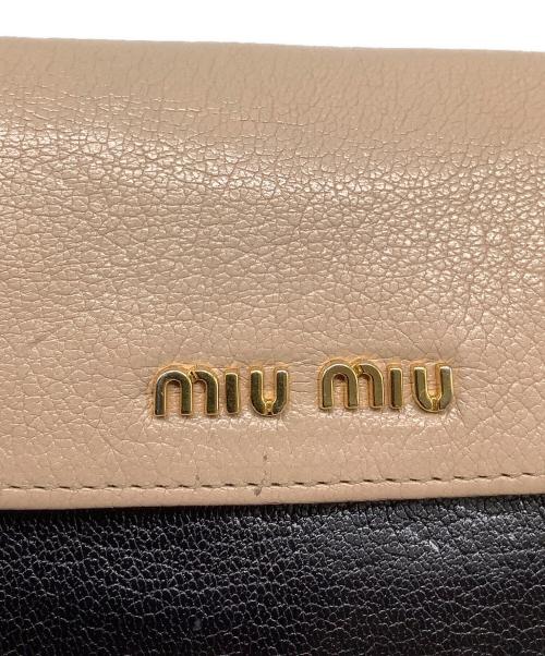 MIU MIU（ミュウミュウ）MIU MIU (ミュウミュウ) 長財布 ブラック×ベージュの古着・服飾アイテム