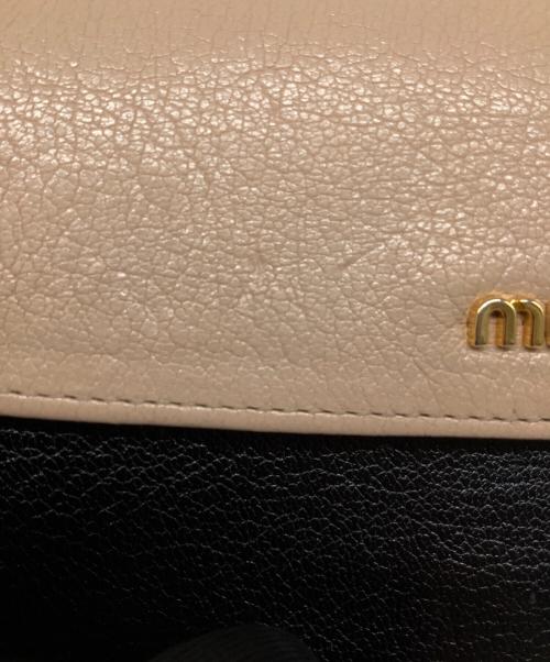 MIU MIU（ミュウミュウ）MIU MIU (ミュウミュウ) 長財布 ブラック×ベージュの古着・服飾アイテム