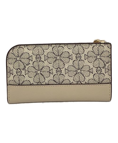 Kate Spade（ケイトスペード）Kate Spade (ケイトスペード) フラワー スモール スリム バイフォールド ウォレット ベージュの古着・服飾アイテム