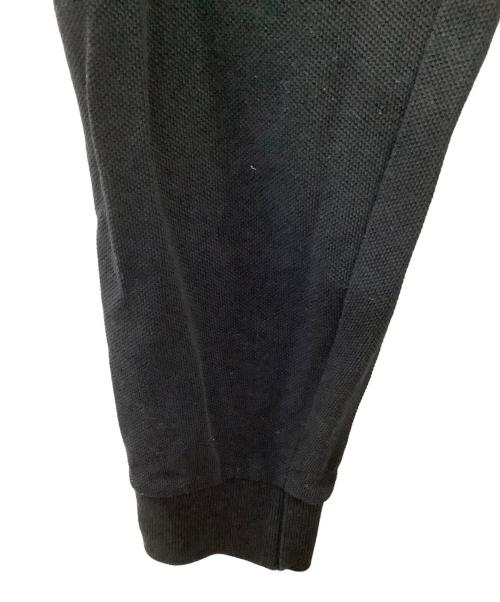 FRED PERRY（フレッドペリー）FRED PERRY (フレッドペリー) ポロシャツ ブラック×ホワイト サイズ:Mの古着・服飾アイテム