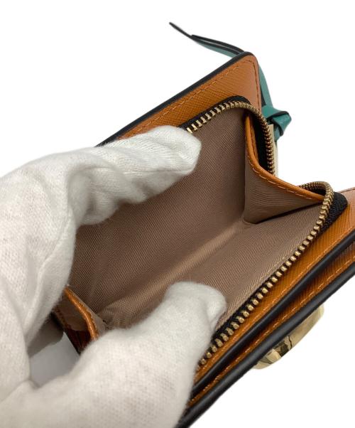 MARC JACOBS（マークジェイコブス）MARC JACOBS (マークジェイコブス) THE SNAP SHOT MINI COMPACT WALLET ブラック×ホワイトの古着・服飾アイテム