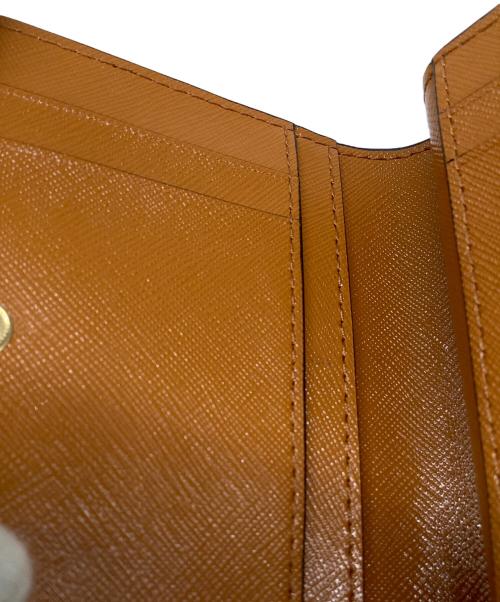 MARC JACOBS（マークジェイコブス）MARC JACOBS (マークジェイコブス) THE SNAP SHOT MINI COMPACT WALLET ブラック×ホワイトの古着・服飾アイテム