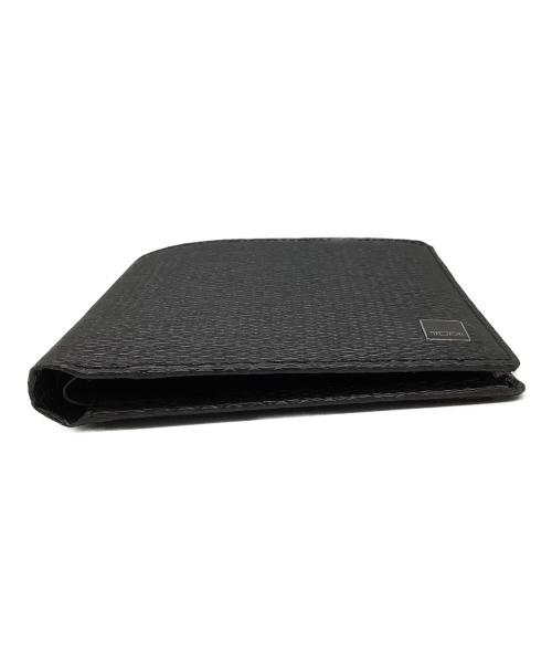 TUMI（トゥミ）TUMI (トゥミ) 2つ折り財布 ブラックの古着・服飾アイテム