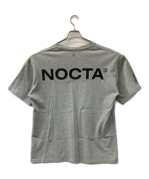 NIKE（ナイキ）NIKE (ナイキ) NOCTA (ノクタ) ショートスリーブ 063D グレー サイズ:XLの古着・服飾アイテム