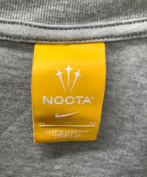 NIKE（ナイキ）NIKE (ナイキ) NOCTA (ノクタ) ショートスリーブ 063D グレー サイズ:XLの古着・服飾アイテム