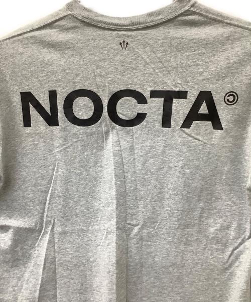 NIKE（ナイキ）NIKE (ナイキ) NOCTA (ノクタ) ショートスリーブ 063D グレー サイズ:XLの古着・服飾アイテム