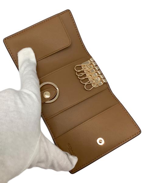 COACH（コーチ）COACH (コーチ) 5連キーケース アイボリー×ピンクの古着・服飾アイテム