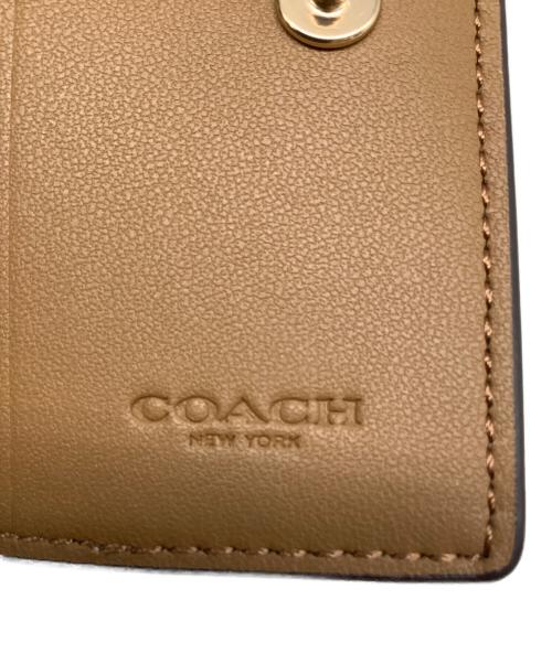 COACH（コーチ）COACH (コーチ) 5連キーケース アイボリー×ピンクの古着・服飾アイテム