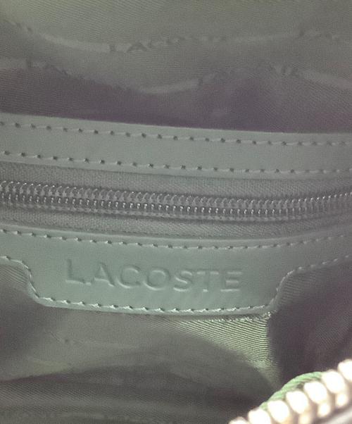 LACOSTE（ラコステ）LACOSTE (ラコステ) CHANTACO バーティカルカメラバッグ ブラックの古着・服飾アイテム