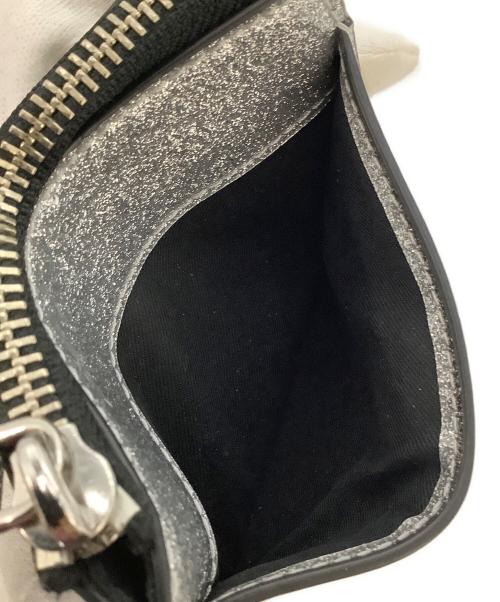MARC JACOBS（マークジェイコブス）MARC JACOBS (マークジェイコブス) コーテッド グリッター トップジップウォレット シルバーの古着・服飾アイテム