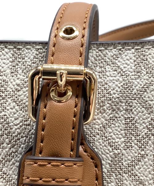 MICHAEL KORS（マイケルコース）MICHAEL KORS (マイケルコース) MKシグネイチャー ベージュ×ブラウン 未使用品の古着・服飾アイテム