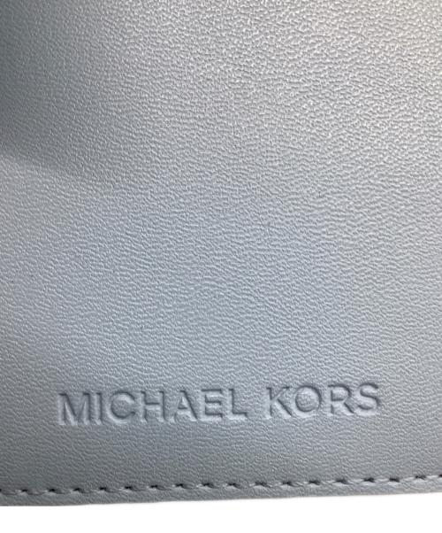 MICHAEL KORS（マイケルコース）MICHAEL KORS (マイケルコース) 2つ折り財布 ブルーの古着・服飾アイテム
