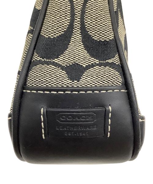 COACH（コーチ）COACH (コーチ) シグネチャー ハンドポーチ グレー×ブラックの古着・服飾アイテム