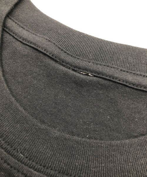 Tanaka Daisuke（タナカ ダイスケ）Tanaka Daisuke (タナカ ダイスケ) アッキガイTシャツ ブラック×ホワイト サイズ:1の古着・服飾アイテム