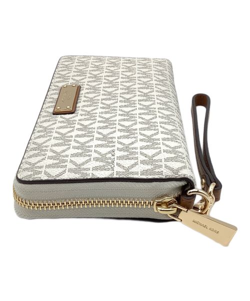 MICHAEL KORS（マイケル・コース）MICHAEL KORS (マイケルコース) ラウンドファスナー財布 アイボリーの古着・服飾アイテム